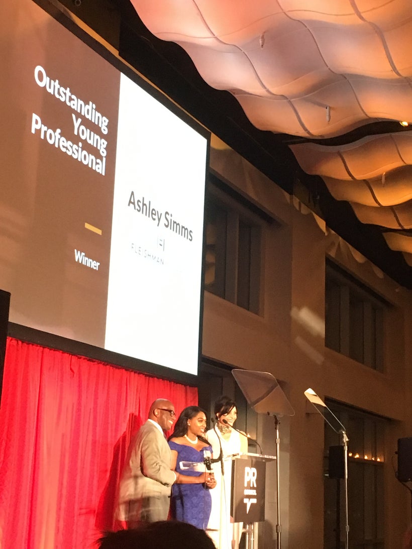Al Roker presents Ashley Simms with the Outstanding Young Professional Award at the 2017 PRWeek and PR Council Diversity Dist