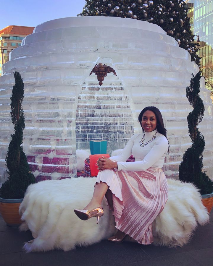 Ashley Simms is pictured celebrating the holidays at City Center in Washington, D.C.