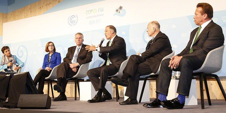 Gov. Jay Inslee speaking during a panel discussion about the U.S. Climate Alliance during the United Nation's Climate Change Conference's 23rd Conference of the Parties (COP23) in Bonn, Germany. He was joined on the panel by Oregon Gov. Kate Brown, California Gov. Jerry Brown, Virginia Gov. Terry McAuliffe and former California Gov. Arnold Schwarzenegger to reassure global leaders of American leadership on climate change. At left is moderator Christiana Figueres, Executive Secretary of the UN Framework Convention on Climate Change.