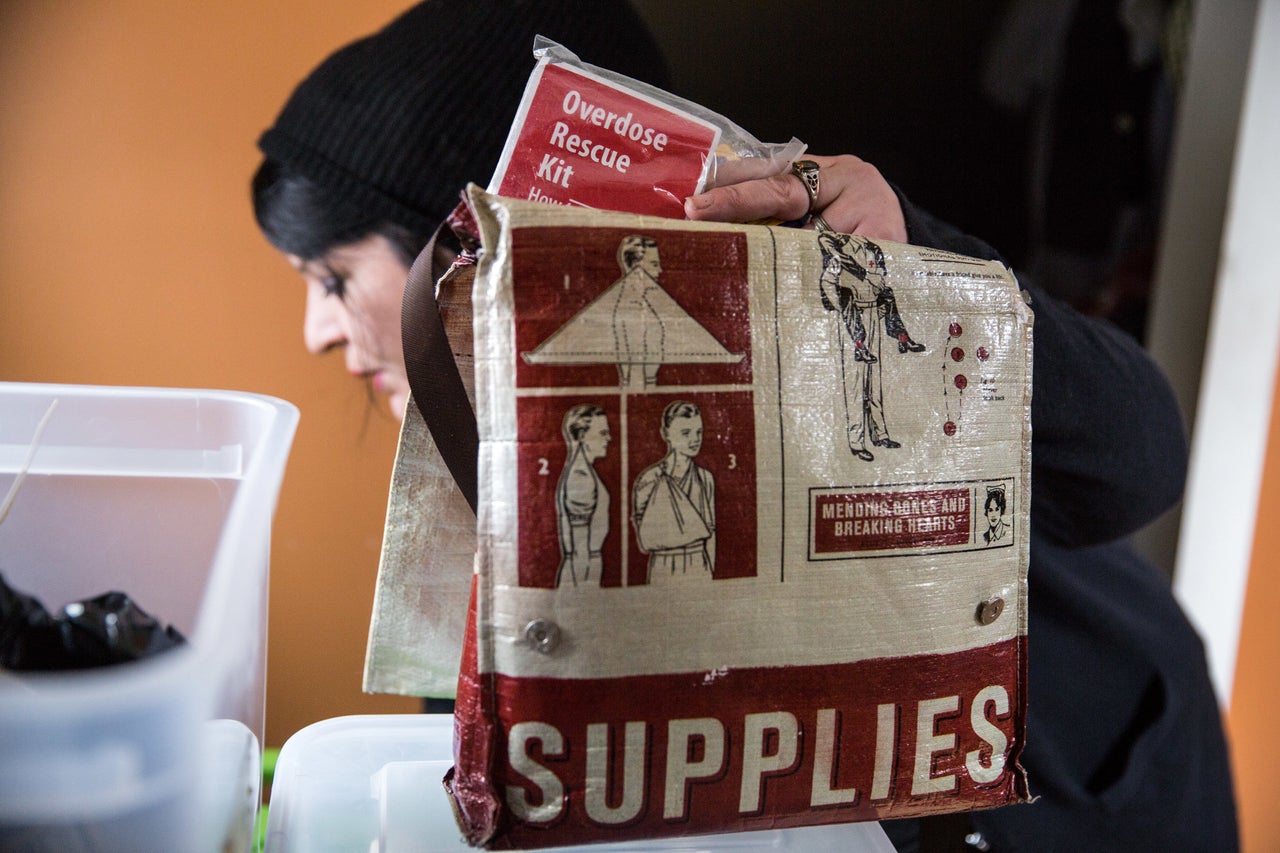 Tilley puts together a bag of safer injection supplies.