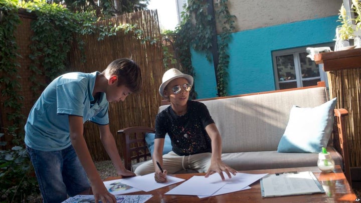 <p><em>Farhad Nouri, working on new pieces in Serbia, where he was recently offered citizenship.</em></p>