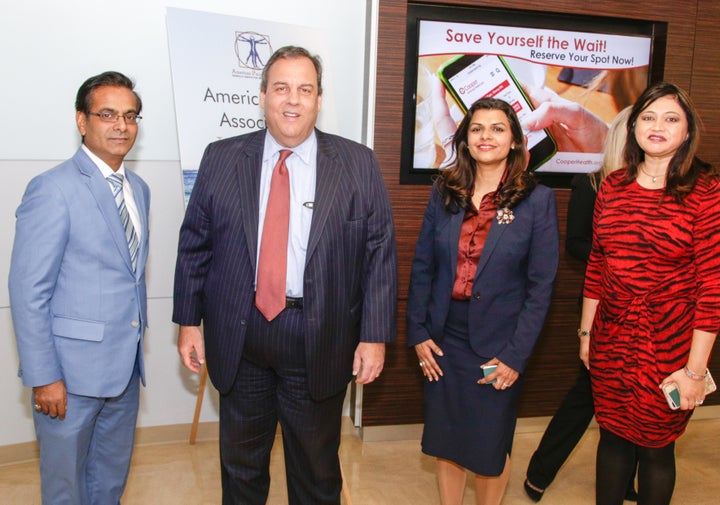 L-R: Dr. Sanjay Gupta, American Pain Association President; New Jersey Governor Chris Christie; Dr. Vanila Singh, Chief Medical Officer for the Office of the Assistant Secretary for Health at the U.S. Department of Health and Human Services; and Dr. Kavita Gupta at the Turn The Tide Summit at Cooper Medical School of Rowan University on December 13, 2017.