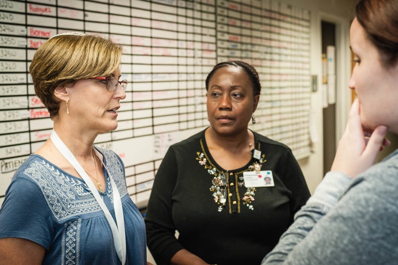 A chaplain confers with staff at Hebrew Senior Life, Roslindale, MA.