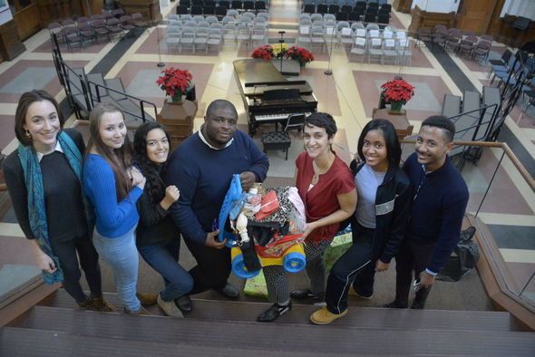  Anton Moore, Founder and President of Unity in the Community collected more than 400 donations for Operation Holiday Help last year. From left, Isabella Plata, 17, Malinda Loglisci, 18, Jenna Diaz, 18, Anton Moore, Grace Palladino, Chikayla Barriner, 18, Levi Martin, 17, at Philadelphia’s Creative and Performing Arts High School . (Philadelphia Tribune) 