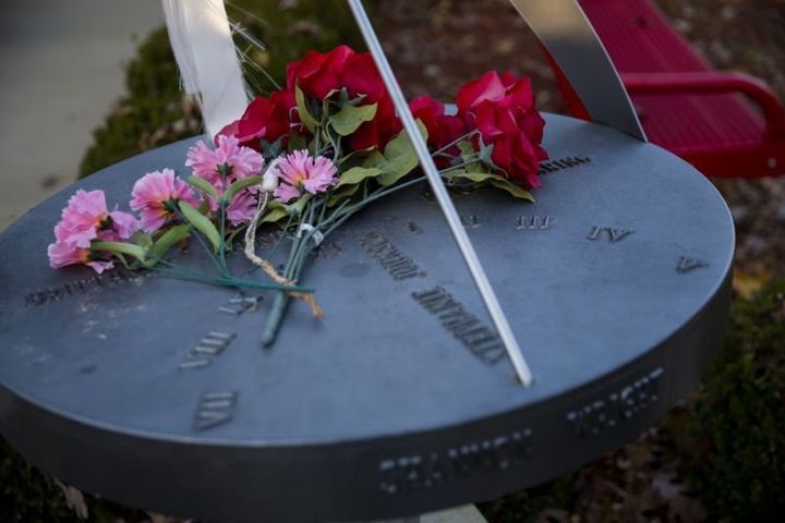 A sundial installed in honor of four children and a teacher killed in the 1998 school shooting. 