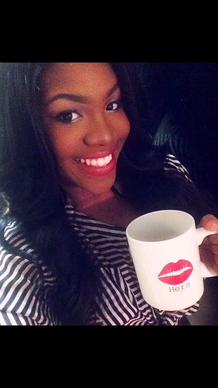 <p>Narcisse James sipping on her favorite pastime, a cup of coffee!</p>