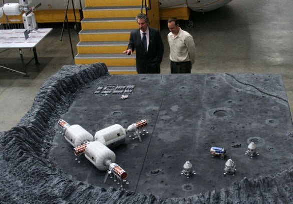 <p>Robert Bigelow (left) and guest with a model of their plans for a lunar base.</p>