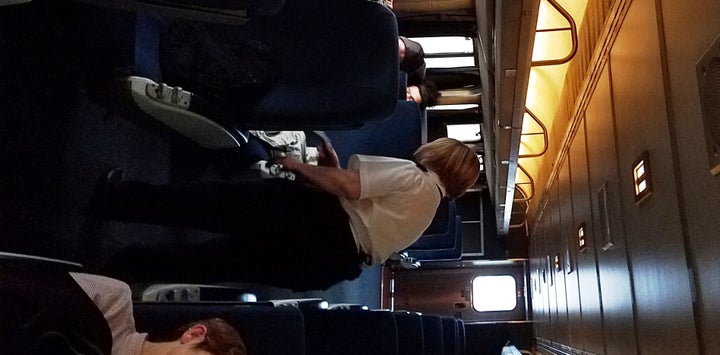 <p>Coach Attendant Mary Hooper continues with her duties Monday on Amtrak’s Empire Builder.</p>