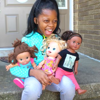 mixed race dolls house family