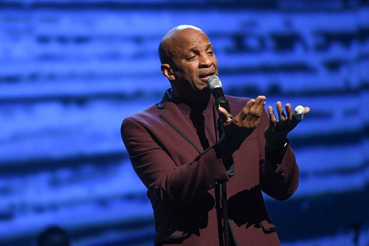 Donnie McClurkin on stage at the Apollo Theater’s Holiday Joy: A Gospel Celebration concert 