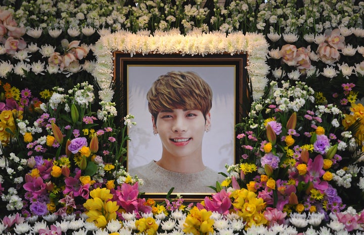 The portrait of Kim Jong-Hyun, a 27-year-old lead singer of the massively popular K-pop boyband SHINee, is seen on a mourning
