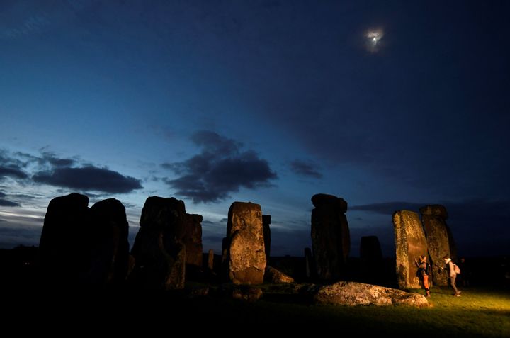 The Stonehenge monument at dawn on winter solstice, on 21 December 2016