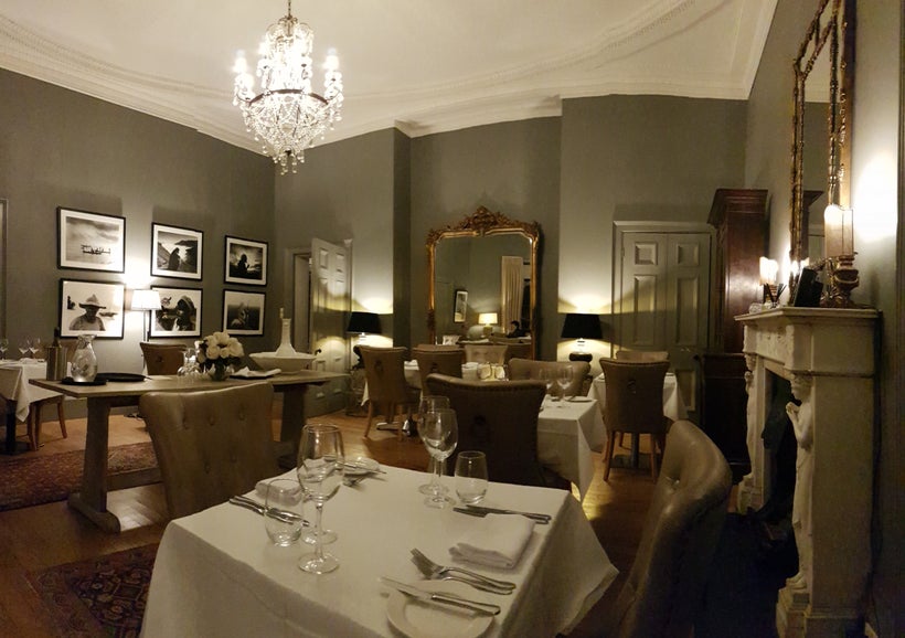 The elegant, candle-lit Bow Room Restaurant, which overlooks the hotel’s gardens