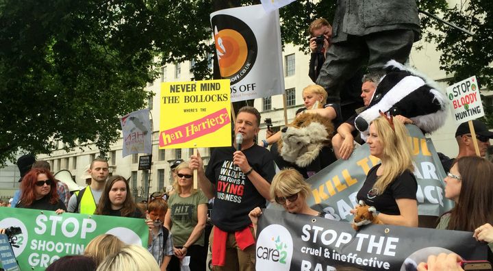 Chris Packham speaks to campaigners protesting against the killing of animals for sport after they marched to Whitehall, London, on the first day of the grouse shooting season.
