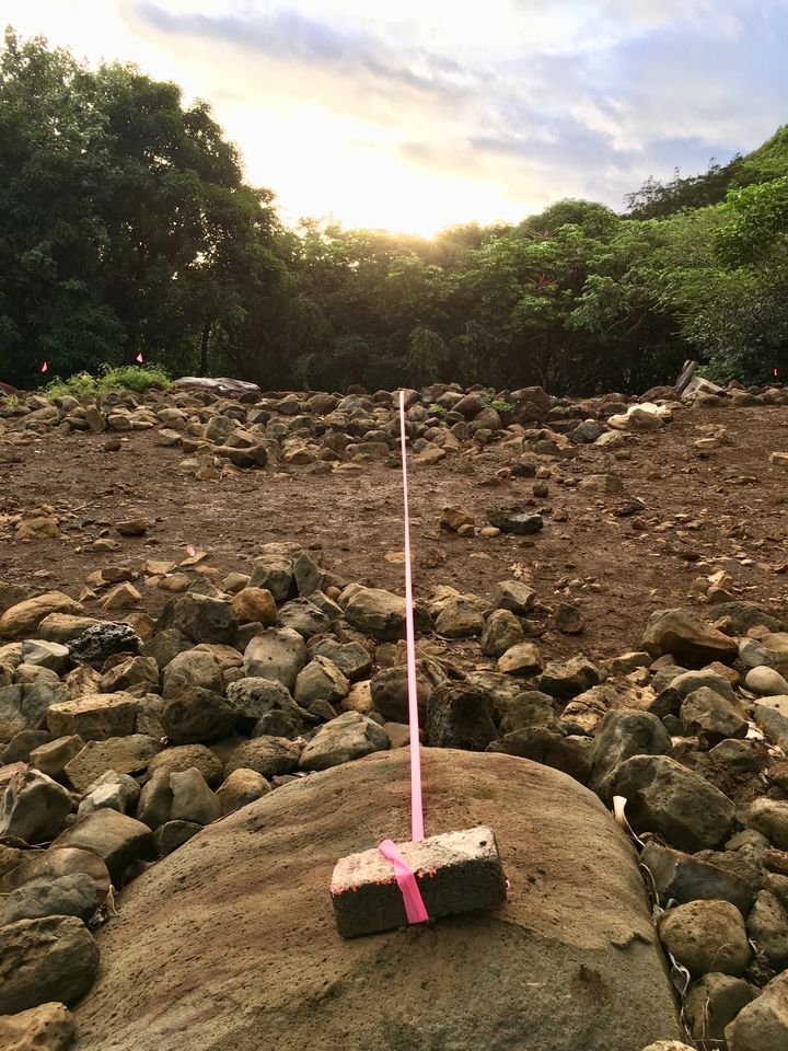 Marking the rising of the sun on Ke Ala Polohiwa a Kanaloa (Winter Solstice) at the face of Maunawila Heiau, Dec 21, 2017.