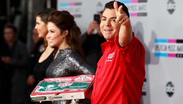 John Schnatter, founder and chief executive of Papa John's Pizza, waves goodbye.