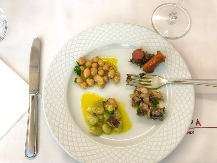 <p>Trying foods on a tour with Culinary Backstreets Lisbon</p>