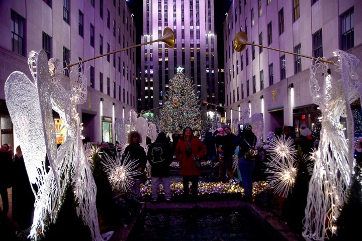 Angels line the path to the Rockefeller Center Christmas Tree.