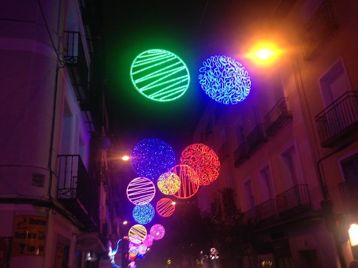 Christmas lights brighten a Madrid street