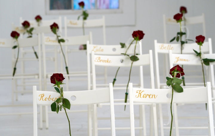 Chairs and roses show where people were found dead at the First Baptist Church of Sutherland Springs.