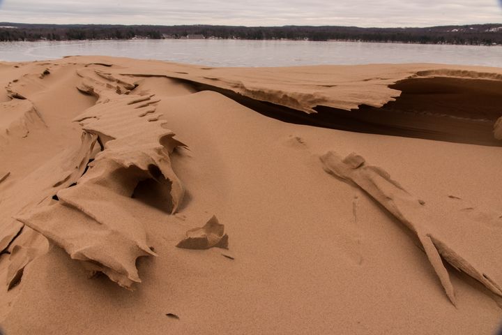 The sculpted sands with a frozen Silver Lake in the background.