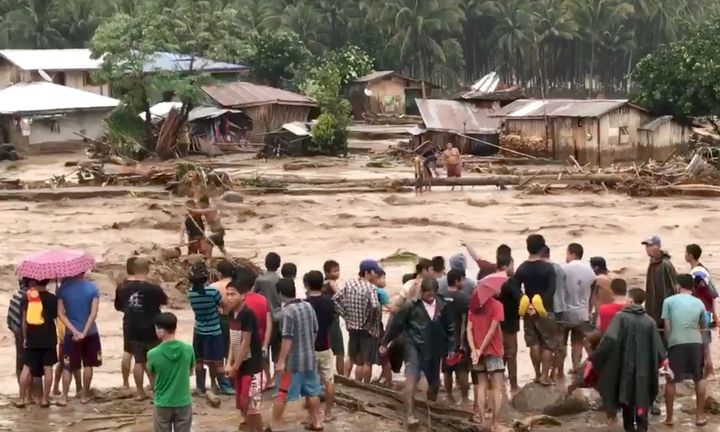 At least 90 people have been reported dead following a tropical storm in the Philippines 