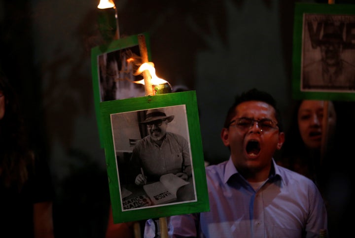 Demonstrators in Mexico City earlier this year held up pictures of journalist Javier Valdez Cardenas to call attention to his killing and the slayings of other journalists in Mexico.