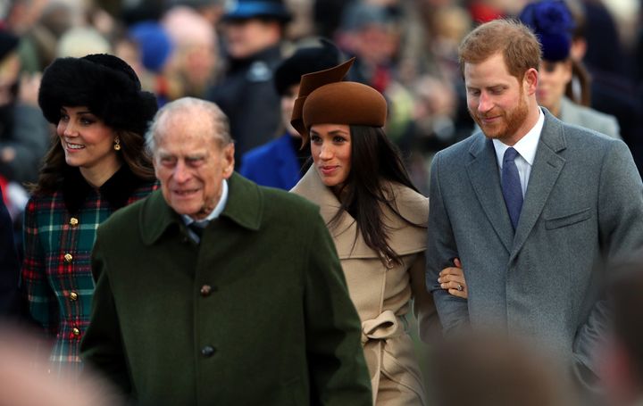 Meghan Markle, pictured arm-in-arm with Prince Harry, the Duchess of Cambridge and Prince Philip 