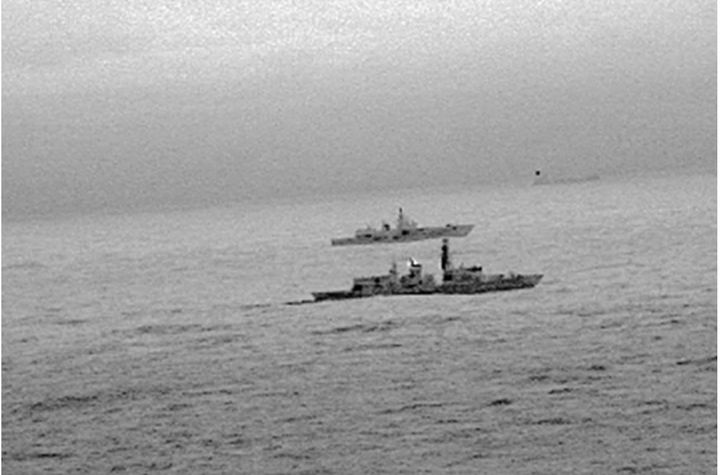 Royal Navy frigate HMS St Albans escorting a Russian warship through the North Sea 