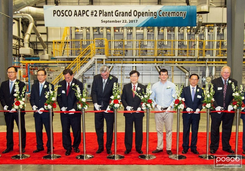 From third to the left to right is Economic and Redevelopment Director Rob Waiz, Governor Eric Holcomb, POSCO CEO Ohjoon Kwo