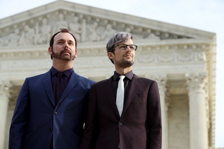 David Mullins (left) and Charlie Craig, the gay couple at the center of a case before the Supreme Court involving a baker who refused to make them a wedding cake. 