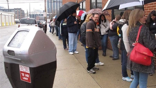 Adoptees wait outside the state Office of Vital Statistics to apply in person for their birth certificates and adoption records in Columbus, Ohio. A number of states have enacted laws giving adult adoptees access to their original, sealed birth certificates.