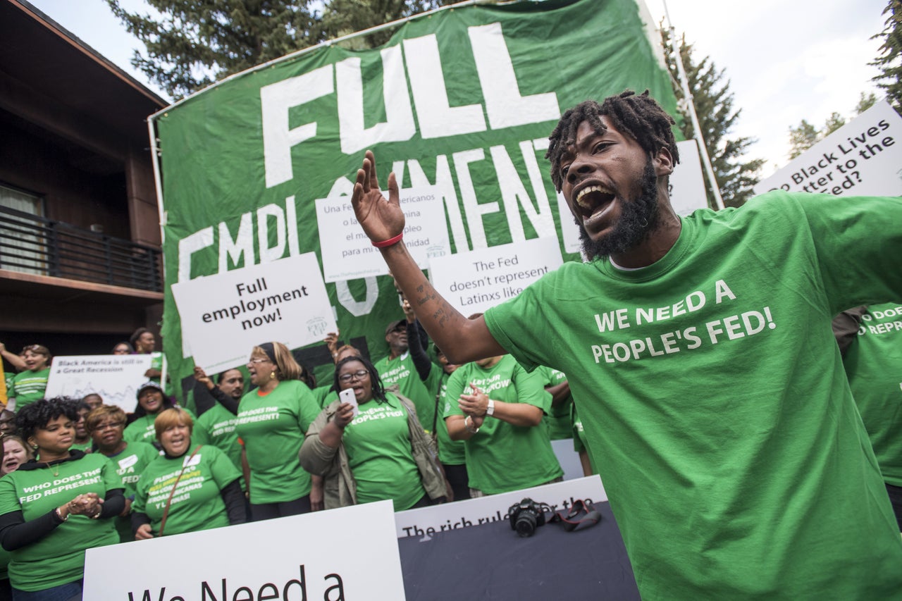 Rod Adams (foreground) rallies Fed Up activists at the 2016 Jackson Hole economic symposium. That year, Fed Up held a discussion with 10 Federal Reserve leaders.