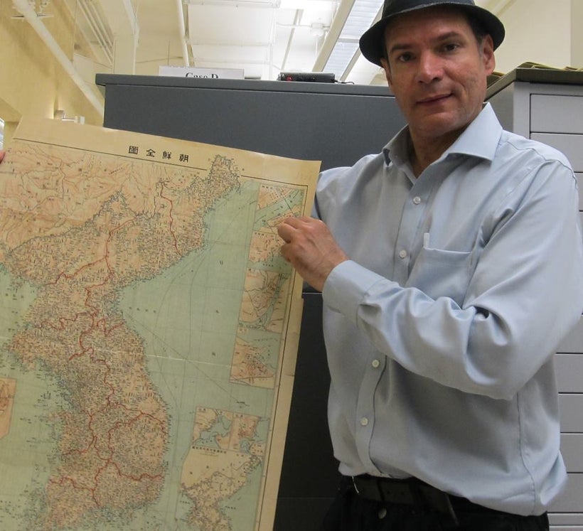 The author of this piece with a map of the peninsula.