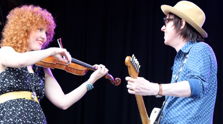<p>Eleanor Whitmore (left) and Chris Masterson perform as members of Steve Earle and the Dukes at the 2013 Ride Festival in Telluride.</p>