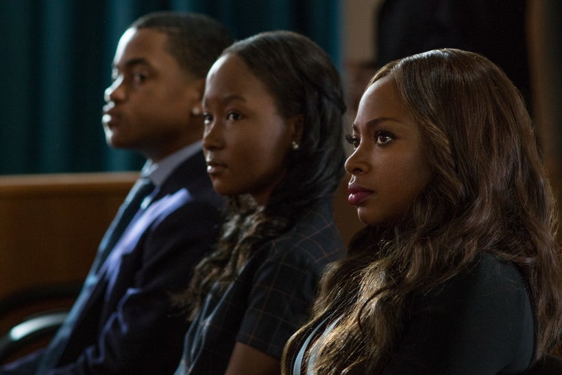 Donshea Hopkins as Raina St. Patrick (center) with her brother Tariq and her mother Tasha.