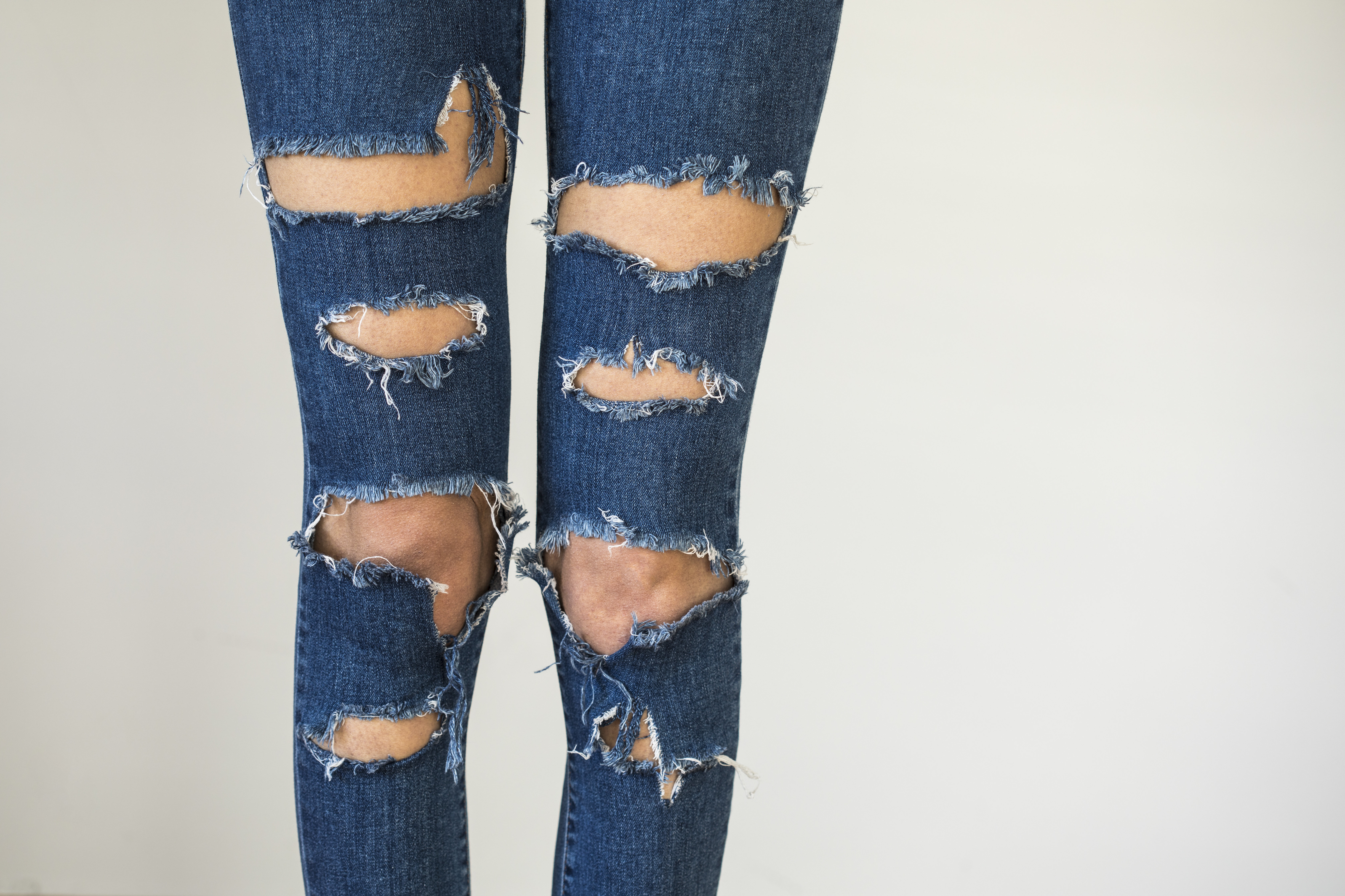 tattered jeans