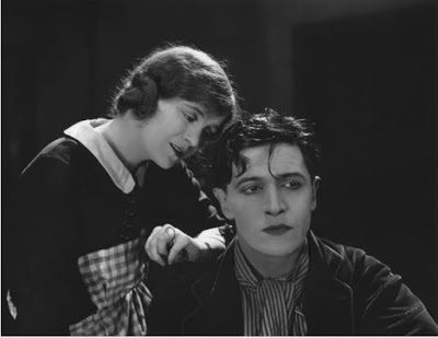 Mae Marsh (Odile) and Ivor Novello (Pierre) in a scene from The Rat 
