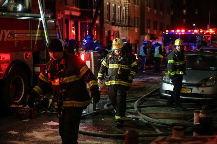 Fire Department of New York personnel at the scene of the fire.