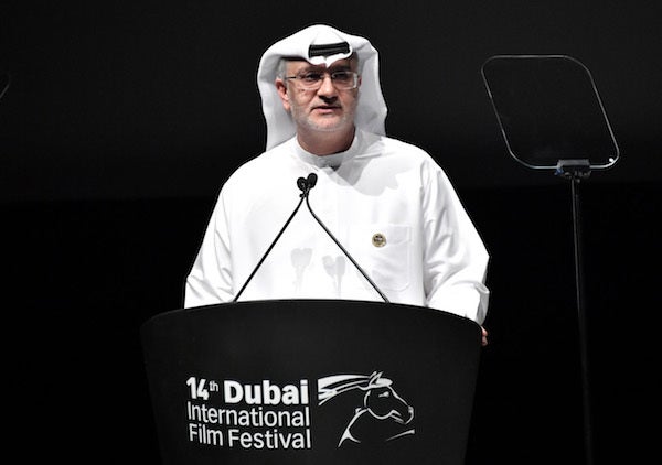 DIFF Artistic Director Masoud Amralla Al Ali speaks onstage during the Opening Night Gala of the 14th annual Dubai Internatio