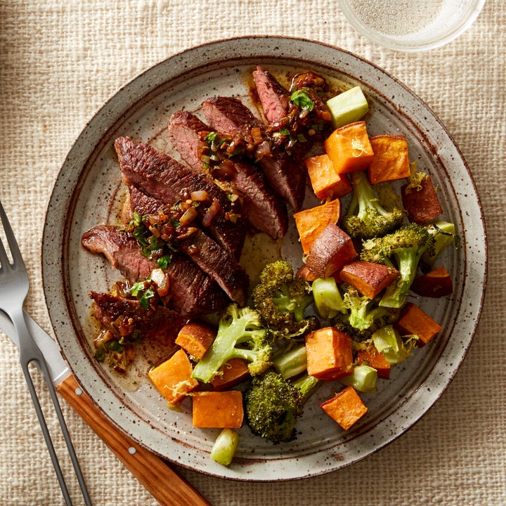 A tasty Whole30-approved Blue Apron recipe of seared steaks and warm lemon salsa verde with roasted broccoli and sweet potato.