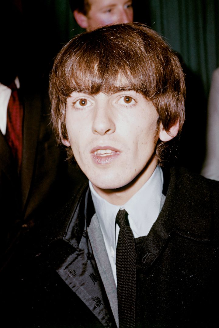 Harrison played rhythm guitar in The Beatles. He died in 2001.