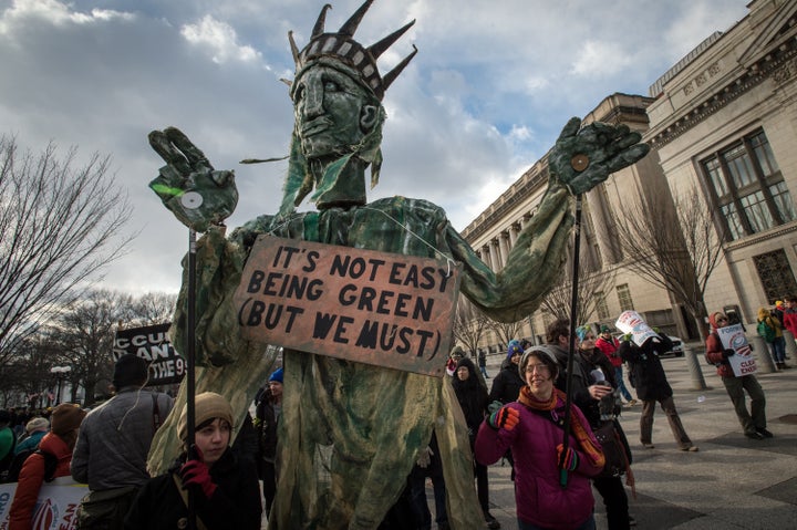 People march to the White House in protest against the Keystone XL Tar Sands Pipe Line in February 2013. 