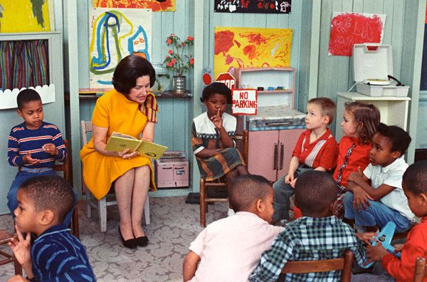 The First Lady Mrs Johnson reads a story to Head Start students in 1966
