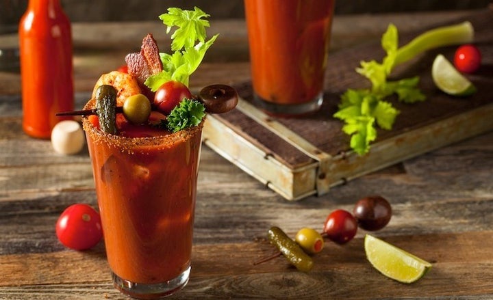 <p>The Bloody Mary garnishes in this photo may be traditional, but the smoked flavor of the drink brings a new twist to the popular cocktail.</p>
