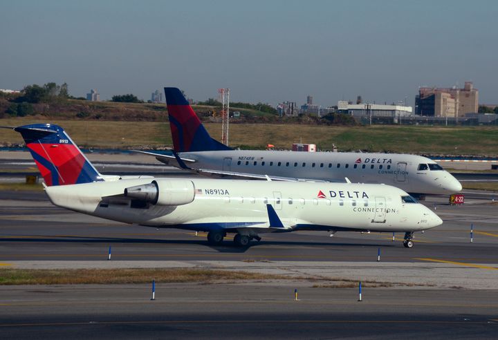 Two Delta airplanes