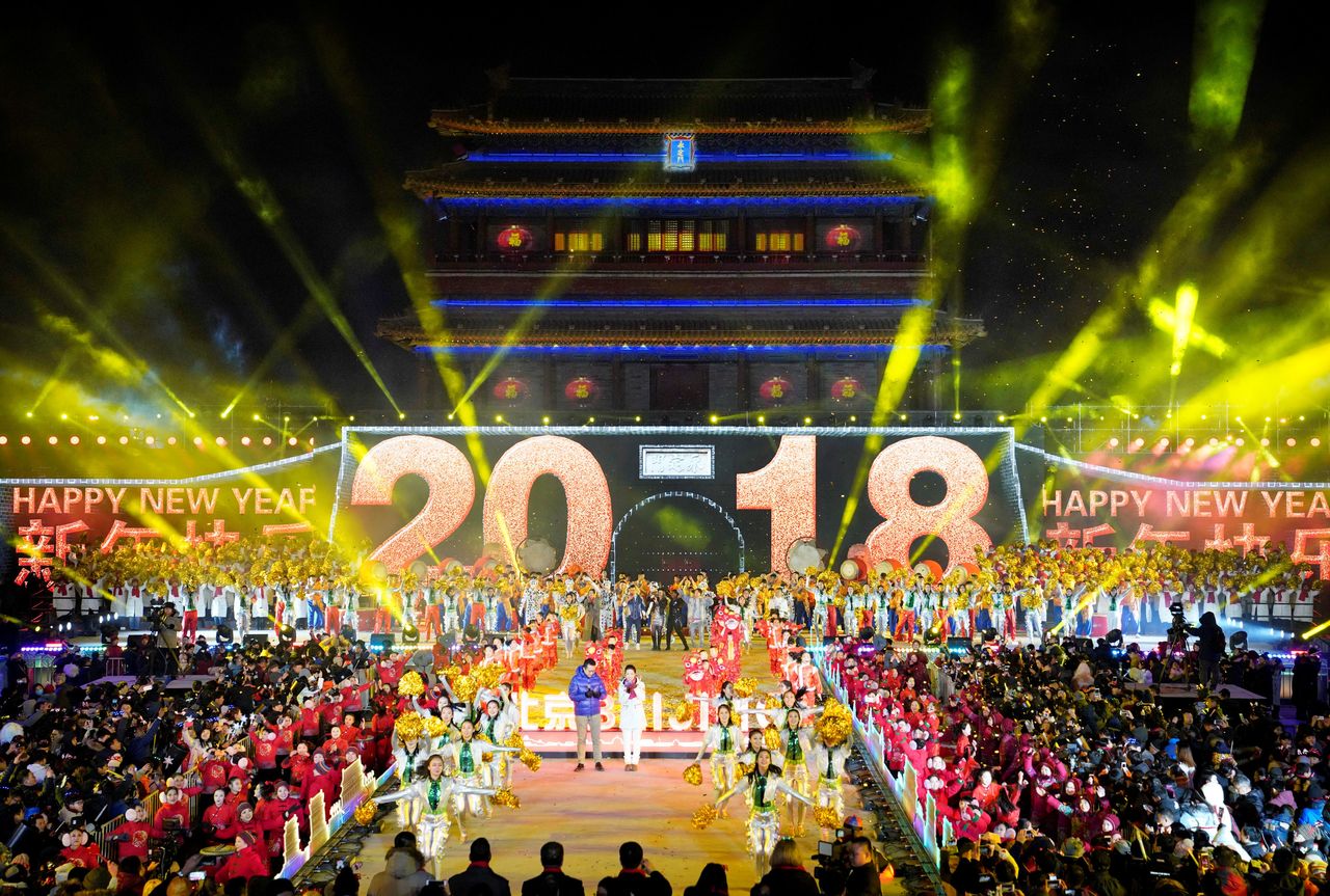 People celebrate the New Year during a countdown event at Yongdingmen Gate in Beijing, China on January 1, 2018.