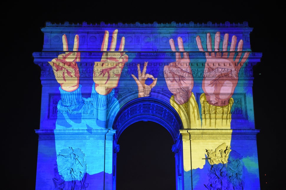 Images are projected on the Arc de Triomphe monument during a laser and 3D video mapping show as part of New Year's celebrations in Paris on December 31, 2017.