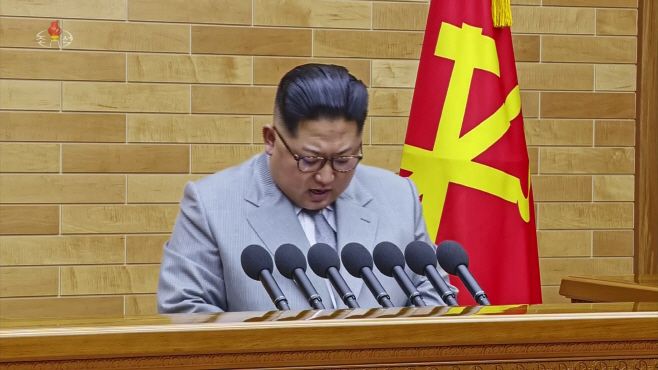 North Korean leader Kim Jong-un delivers his New Year's speech in North Korea on Monday, Jan. 1, 2018./ Source: captured image of Korean Central News Agency from Yonhap News