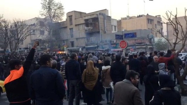 People protest in Tehran, Iran on December 30, 2017 in this still image from a video obtained by Reuters. (Reuters)